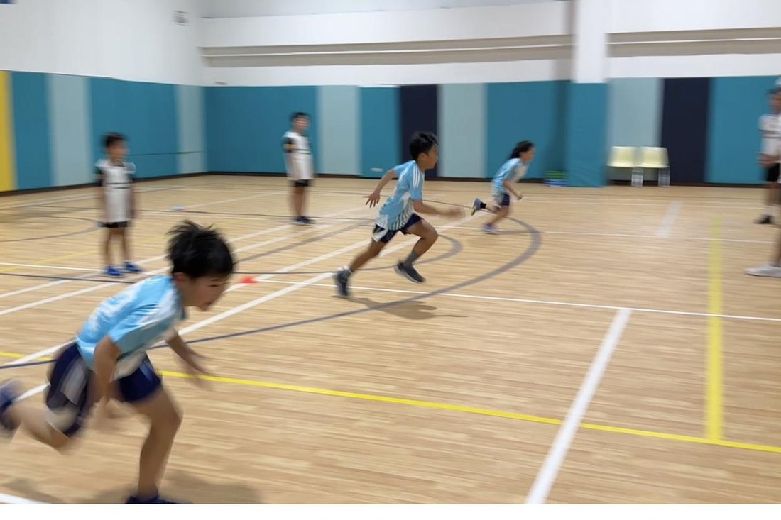 Children practising sprint starts