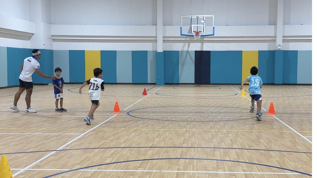 Children doing cone agility drills