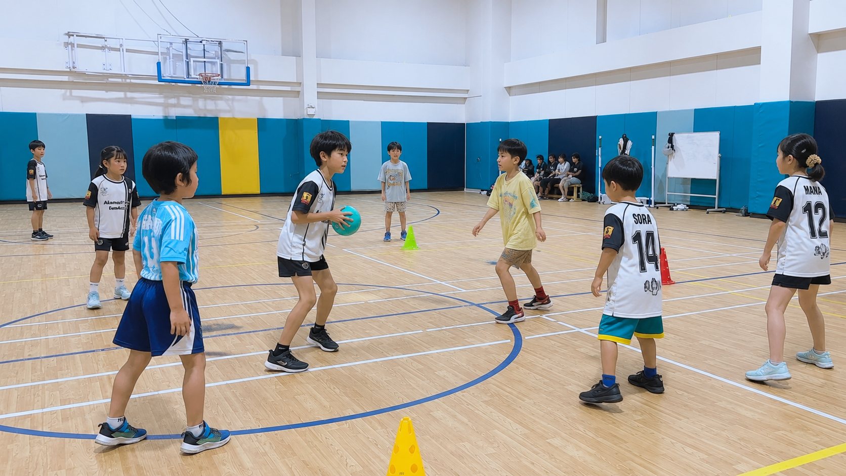 円になってパス練習をする子どもたち