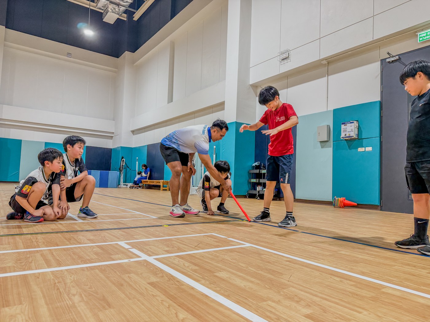Children measuring their standing long jump at an ASA fitness test